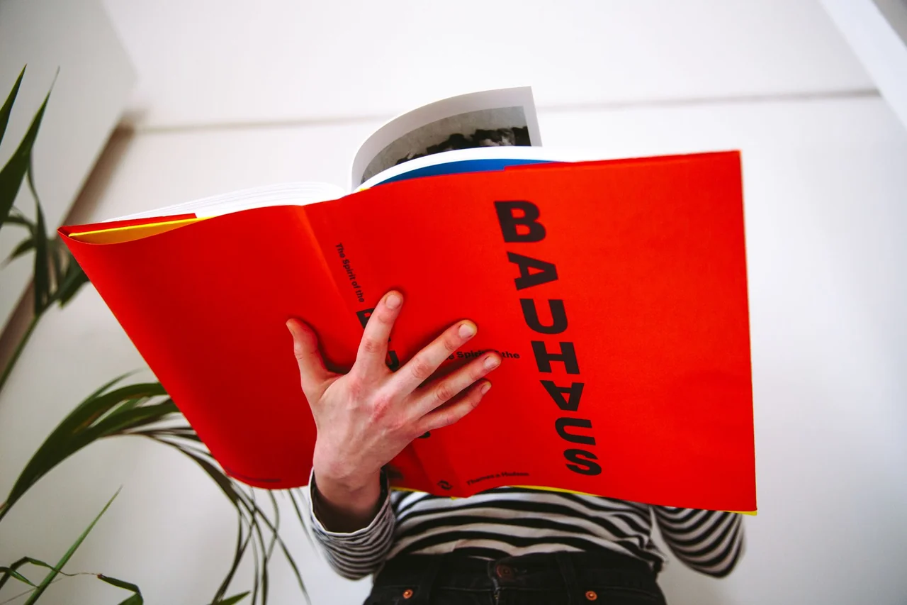 Editorial book inspection exploring European modernist design principles