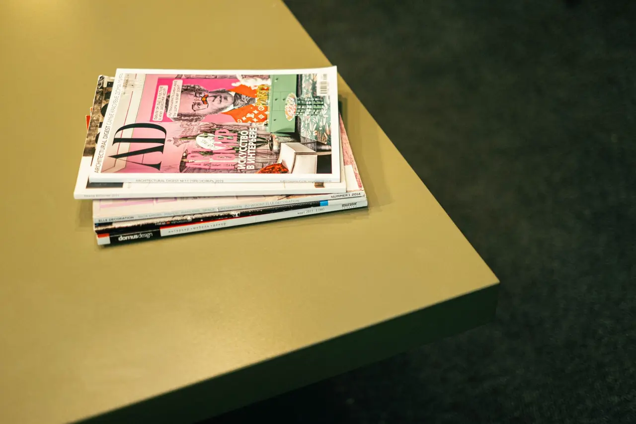 Editorial brand guidelines and typography specimens on pristine paper