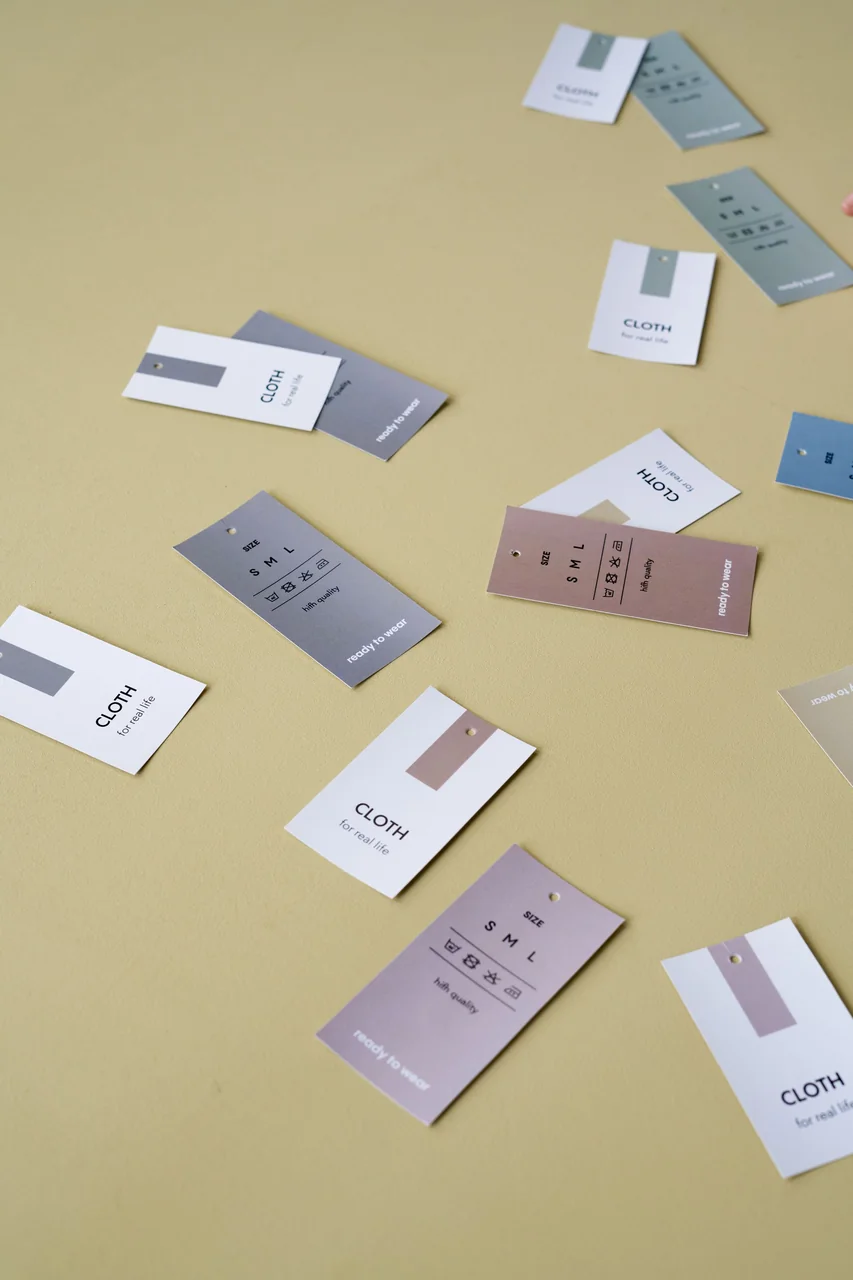 Textile swatches and label design representing branding discipline